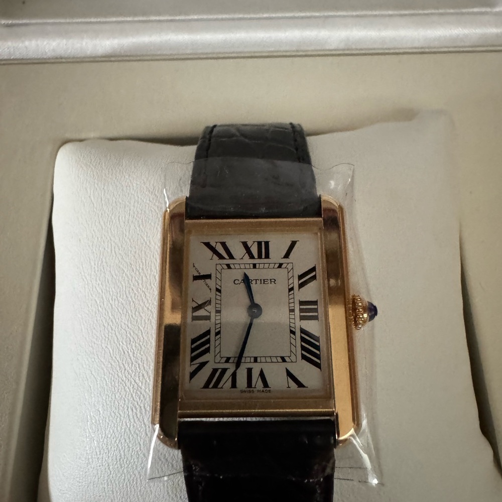 Cartier Gold and Black Watch